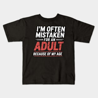 i'm often mistaken for an adult because of my age Kids T-Shirt